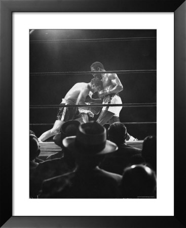 Heavyweight Championship Bout Between Rocky Marciano And Ezzard Charles At Yankee Stadium by Ralph Morse Pricing Limited Edition Print image