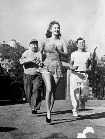 Actor W. C. Fields Jogging Along With Actress Maria Montez And His Trainer Bob Howard by Peter Stackpole Pricing Limited Edition Print image