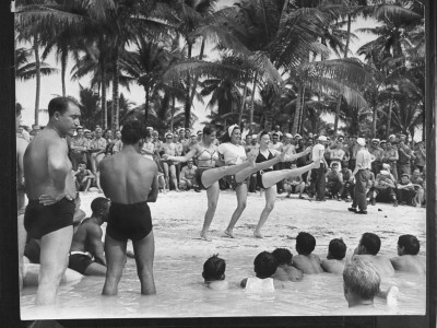 Trio Of Chorus Girls In Swimsuits, Doing High-Kicks, For Navy Personne, On A Uso Tour Stopover by Peter Stackpole Pricing Limited Edition Print image