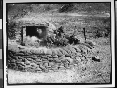 Mortar Crew Fireing At Enemy Position From Behind Sandbagged Entrenchment, During Korean War by Guy A. Kassal Pricing Limited Edition Print image