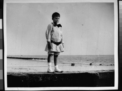 Young Chester Lord Standing On The Beach At Sea Gate, Brooklyn, Ny by Wallace G. Levison Pricing Limited Edition Print image