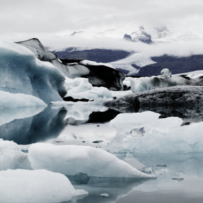 Iceberg Floating In Water, Vatnajokull Glacier, Iceland by Ulrika Malm Pricing Limited Edition Print image