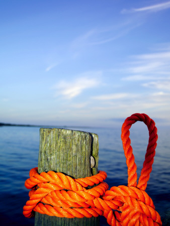 A Rope Tied Around A Wooden Pole At A Dock In An Archipelago by Christian Lagerek Pricing Limited Edition Print image