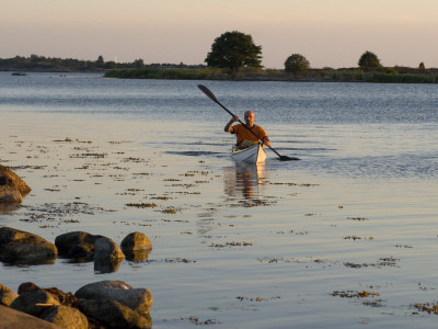 Man Kayaking In The Sea, Sweden by Bjorn Wiklander Pricing Limited Edition Print image