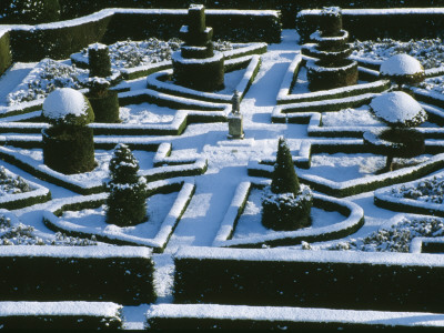 A Snow Covered Knot Garden At Great Fosters, Surrey, Photographed From The Roof Of The Hotel by Clive Nichols Pricing Limited Edition Print image