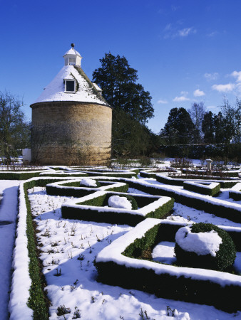 Snow Blankets The Pigeon House And Rose Parterre At Rousham Park, Oxfordshire by Clive Nichols Pricing Limited Edition Print image