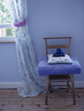 Blue Bedroom Chair With Blankets And Cushion Next To Open Window by Gary Hamill Pricing Limited Edition Print image
