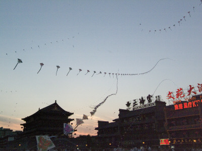 Drum Tower Main Square With Kites, Xian, China by Natalie Tepper Pricing Limited Edition Print image