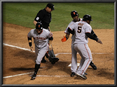 Texas Rangers V. San Francisco Giants, Game 5:  (L-R) Cody Ross, Edgar Renteria And Juan Uribe by Stephen Dunn Pricing Limited Edition Print image