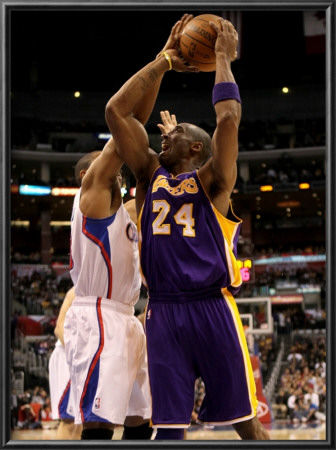 Los Angeles Lakers V Los Angeles Clippers: Kobe Bryant And Eric Gordon by Stephen Dunn Pricing Limited Edition Print image