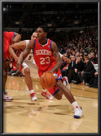 Philadelphia 76Ers V Toronto Raptors: Louis Williams And Jerryd Bayless by Ron Turenne Pricing Limited Edition Print image