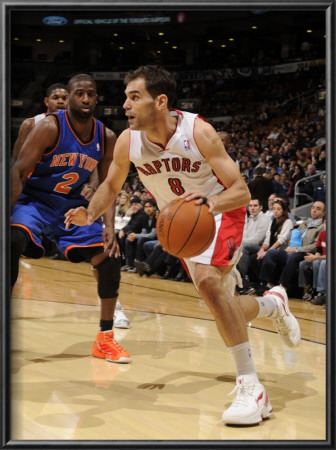New York Knicks V Toronto Raptors: Jose Calderon And Raymond Felton by Ron Turenne Pricing Limited Edition Print image