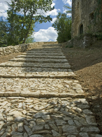Looking Up Broad Steps To An Ancient Church In Provence, With Sky by Stephen Sharnoff Pricing Limited Edition Print image