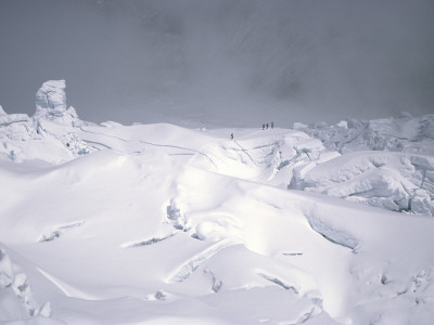 Climbers Crossing A Dark And Snowy Khumbu Ice Fall, Nepal by Michael Brown Pricing Limited Edition Print image