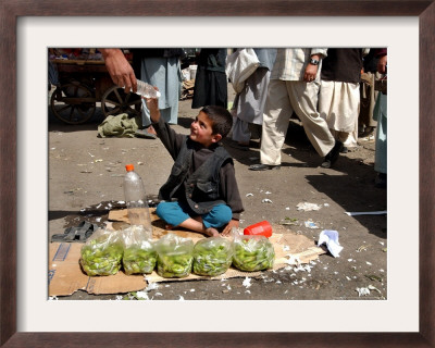 Afghan Child 5, Receives A Bottle Of Water by Musadeq Sadeq Pricing Limited Edition Print image