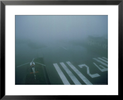 Lukla Airport In Low Cloud, Khumbu, Nepal by Paul Franklin Pricing Limited Edition Print image
