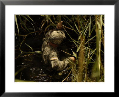 A Us Army Soldier Searches For Three Missing Soldiers In Yusifiyah, Iraq, May 15, 2007 by Stocktrek Images Pricing Limited Edition Print image