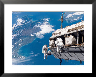 Sts-116 Mission Specialists Participate In The First Of The Three Mission's Extravehicular Activity by Stocktrek Images Pricing Limited Edition Print image