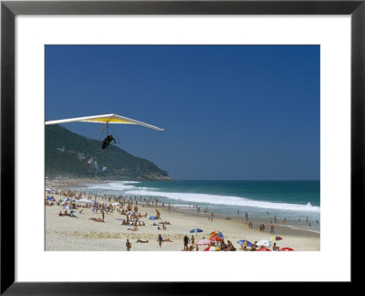 Hang-Glider Landing On Pepino Beach, Rio De Janeiro, Brazil, South America by Marco Simoni Pricing Limited Edition Print image