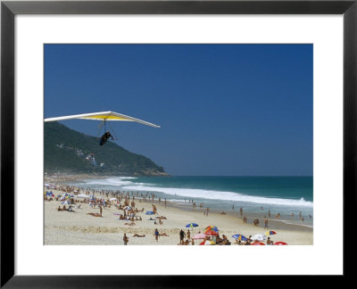 Hang-Glider Landing On Pepino Beach, Rio De Janeiro, Brazil, South America by Marco Simoni Pricing Limited Edition Print image