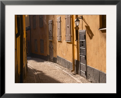 Cobblestone Street In Gamla Stan, Iron Cellar Door And Old Lamp, Stockholm, Sweden by Per Karlsson Pricing Limited Edition Print image