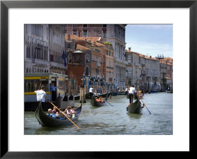 Gondoliers Escort Tourists Down The Grand Canal, Venice, Italy by Robert Eighmie Pricing Limited Edition Print image