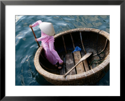 Woman Rows Basket Boat On Vietnam's South Central Coast, Nha Trang, Khanh Hoa, Vietnam by Stu Smucker Pricing Limited Edition Print image