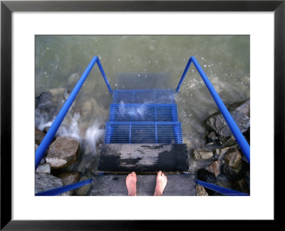Feet Entering The Thermal Waters Of Lake Balaton, Keszthely, Hungary by Martin Moos Pricing Limited Edition Print image
