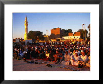 Eid-Al-Fitr Prayers Ending Ramadan, Edfu, Egypt by Wayne Walton Pricing Limited Edition Print image