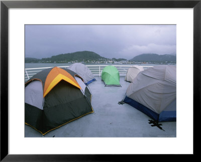 Tents Pitched By Campers On The Deck Of A Ferry by Rich Reid Pricing Limited Edition Print image