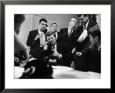 Senator John F. Kennedy Talking On The Phone Surrounded By Aides During The Primary Elections by Stan Wayman Pricing Limited Edition Print image