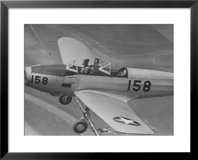 Fledgling Pilot Of The Women's Flying Training Detachment Soloing In Her Pt 19 Army Trainer by Peter Stackpole Pricing Limited Edition Print image