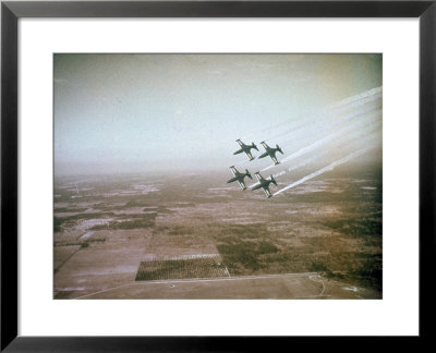 Us Navy Stunt Pilots Of The Blue Angels Flying Their F9f Jets During An Air Show by J. R. Eyerman Pricing Limited Edition Print image
