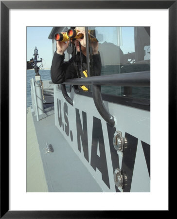 Us Navy Mate Looks Through Binoculars As He Patrols The Coastal Waters Of The Persian Gulf by Stocktrek Images Pricing Limited Edition Print image