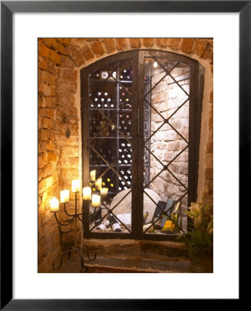 Wine Cellar With Bottles Behind Iron Bars, Stockholm, Sweden by Per Karlsson Pricing Limited Edition Print image