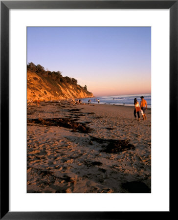 Couple Walking Down Henry's Beach, Santa Barbara, California by Savanah Stewart Pricing Limited Edition Print image