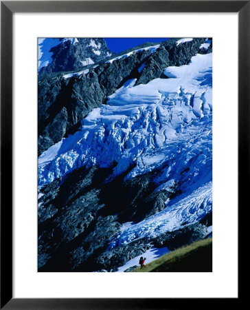 Hiker Ascending At Cascade Saddle, Mt. Aspiring National Park, Otago, New Zealand by Gareth Mccormack Pricing Limited Edition Print image