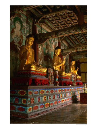 Three Reclining Gold Buddhas And Ornate Decoration In Seonunsa Temple, Jeollabuk-Do, South Korea by Bill Wassman Pricing Limited Edition Print image