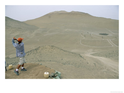 A Golfer Hits A Drive At The Club De Golf In The Atacama Desert by Joel Sartore Pricing Limited Edition Print image