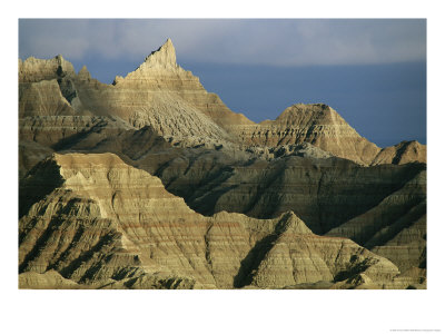 Dramatic Peaks Dominate A Portion Of Badlands National Park by Annie Griffiths Belt Pricing Limited Edition Print image