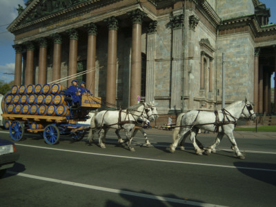 Horses Pull A Cart Load Of Beer Kegs Past St. Isaacs Cathedral by Richard Nowitz Pricing Limited Edition Print image