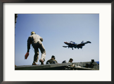 A Fighter Plane Lands Onboard An Aircraft Carrier by Joseph Baylor Roberts Pricing Limited Edition Print image