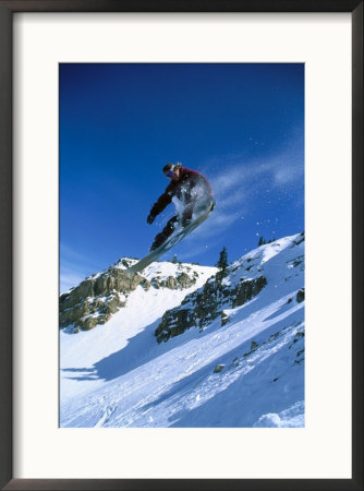 Person Holding Snowboard While Jumping by Rob Gracie Pricing Limited Edition Print image