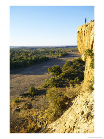 View Of Motloutse River Bed And Eagle Rock, Botswana by Roger De La Harpe Pricing Limited Edition Print image