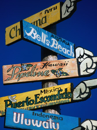 Sign Pointing To Famous Surfing Spots From Around The World, Pichilemu, Chile by Paul Kennedy Pricing Limited Edition Print image