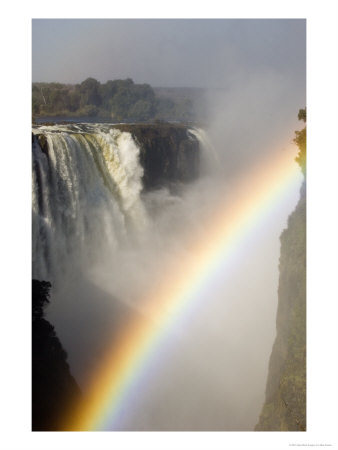 Victoria Falls With Rainbow, Zimbabwe by Mike Powles Pricing Limited Edition Print image