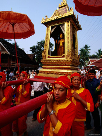 Men In Traditional Costume Carrying Phra Bang Buddha Image, Luang Prabang, Laos by Alain Evrard Pricing Limited Edition Print image