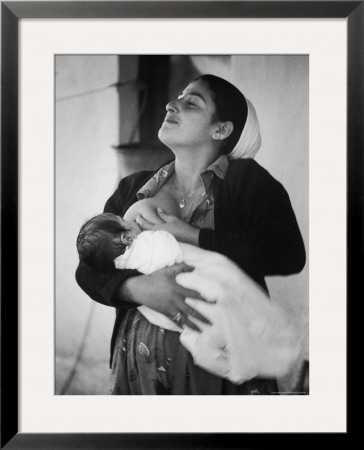 Israeli Mother Breast Feeding Her Baby by Paul Schutzer Pricing Limited Edition Print image