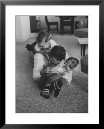 Mike Sibole, Four-Year-Old Recently Blinded To Save His Life, Playing With Father And Brother by Stan Wayman Pricing Limited Edition Print image