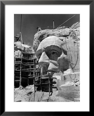 Scaffolding Around Head Of Abraham Lincoln, Partially Sculptured During Mt. Rushmore Construction by Alfred Eisenstaedt Pricing Limited Edition Print image
